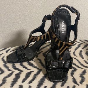 Vaneli embossed black Patton with zebra stripe fur dress heels